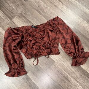 “Baddie” off the shoulder crop top.